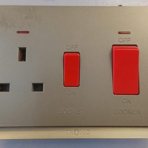 Tronic switched socket and cooker control unit